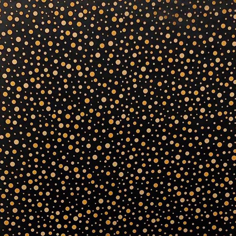 Gift wrapping paper mirror shiny gold dots on a matte black background.
 